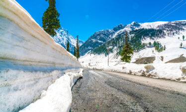 Beautiful River and snow covered mountains landscape Kashmir state, India